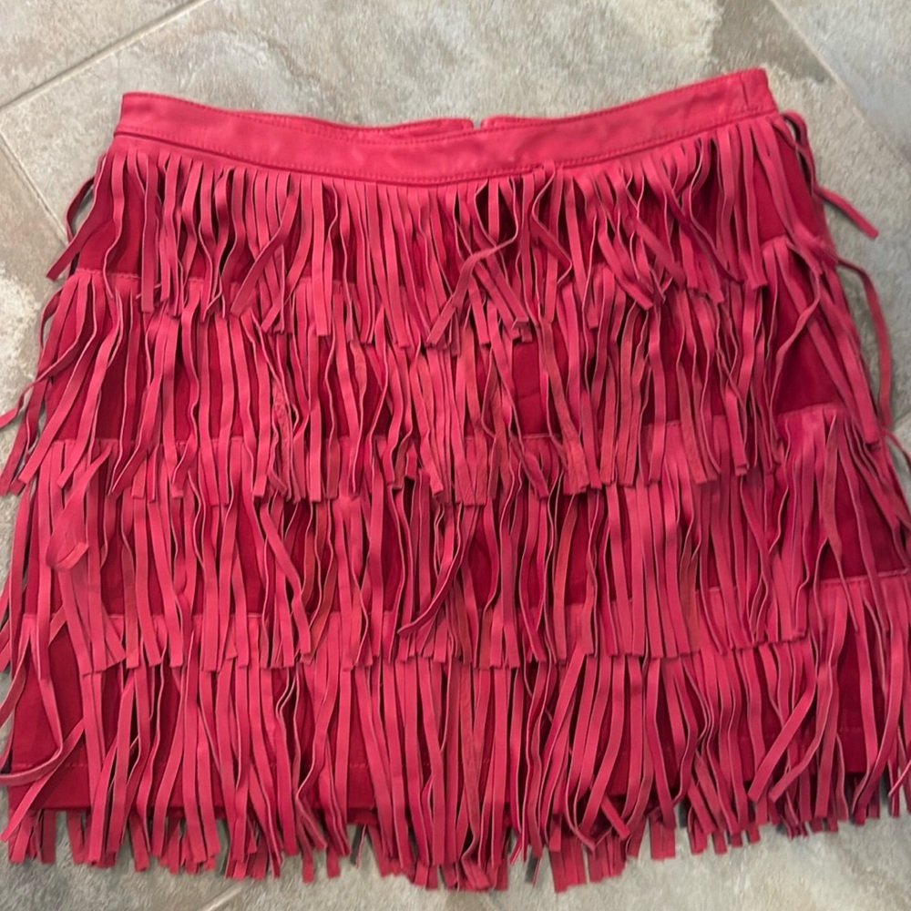 Pink leather fringe mini skirt